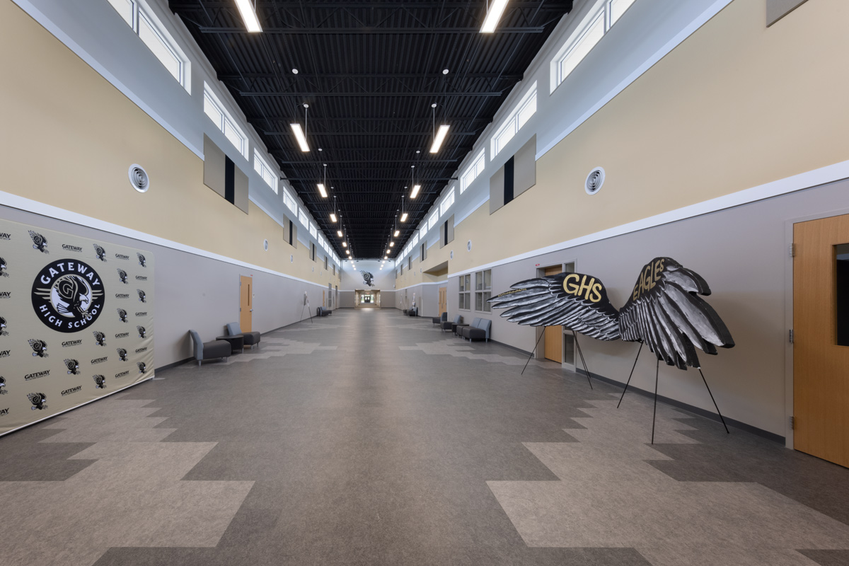 Interior design view of the entry corridor at Gateway High School in Fort Myers, FL.